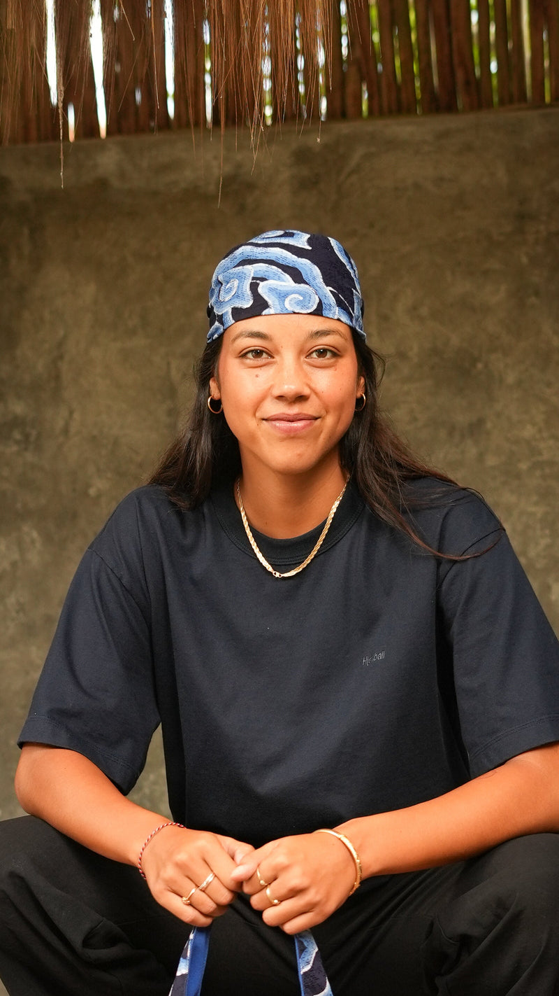 Blue batik bandana with a matching batik bag