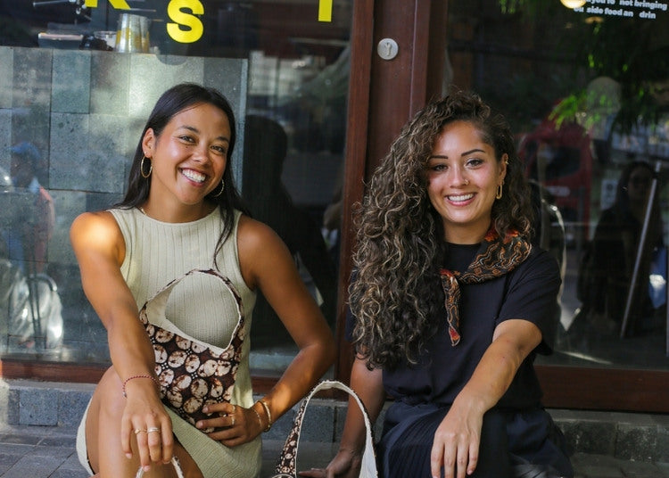 Model wearing handmade Batik bag – ethical Indonesian fashion